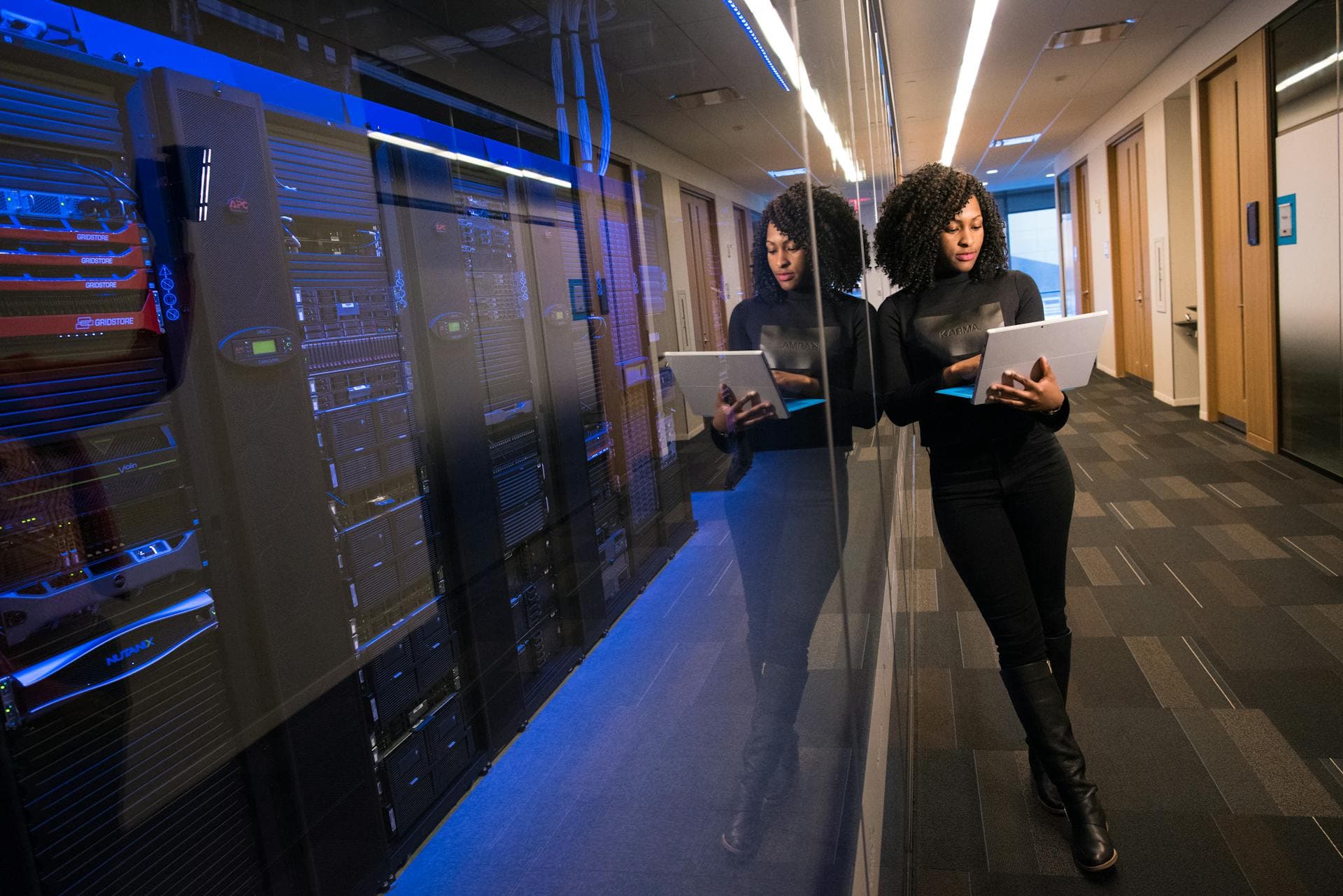 Operators walking through a data-center control environment