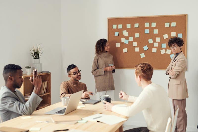 Project planning sticky notes on glass
